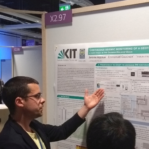 Jerome Azzola presenting a poster